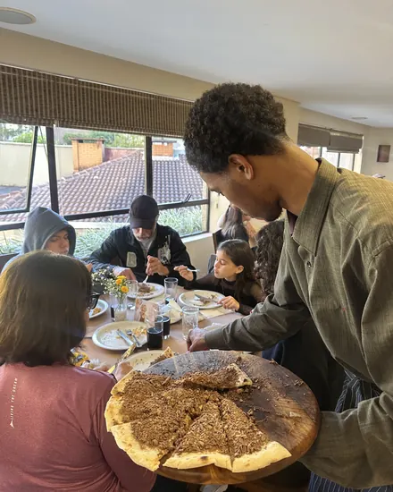 Pizza doce servida à mesa no fim do rodízio
