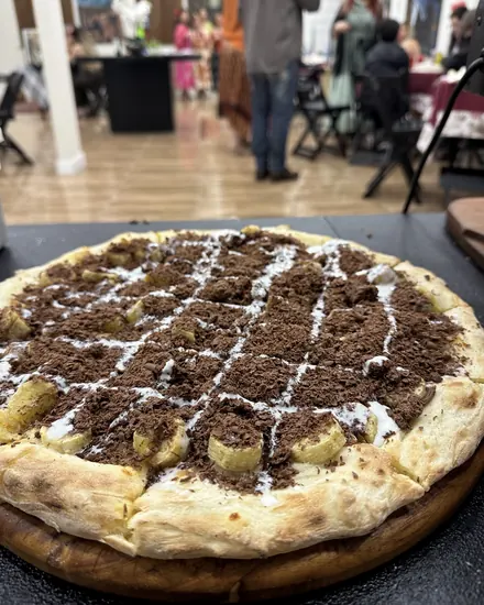 Pizza doce de chocolate com banana