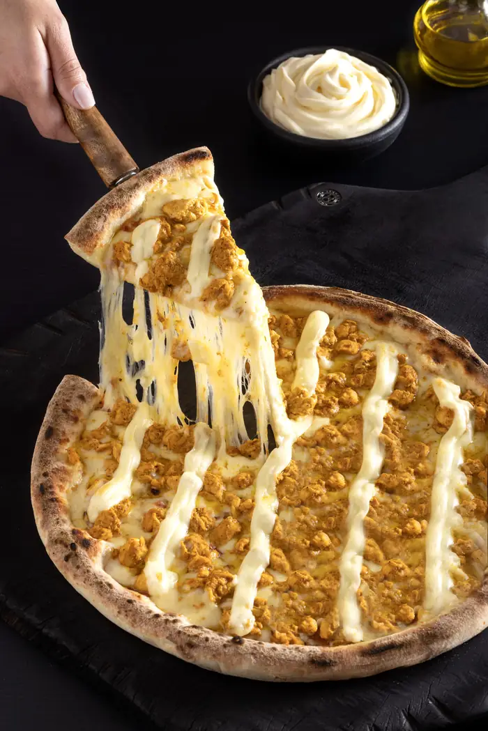 Pizza de frango com requeijão, um dos sabores do cardápio Repertório